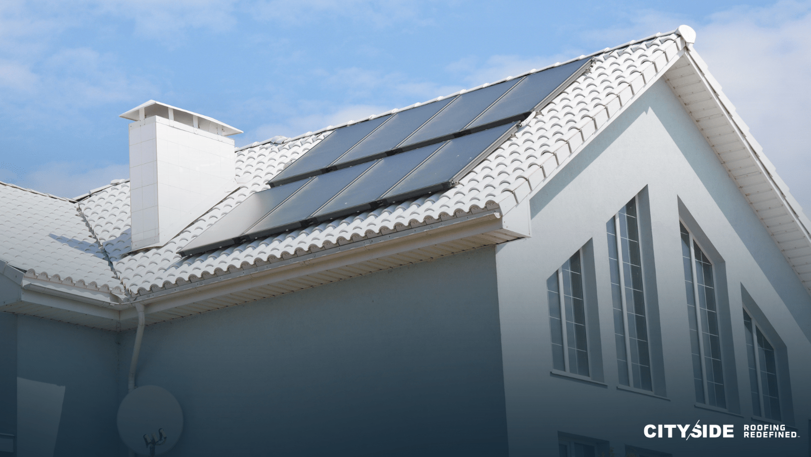 A house featuring solar panels installed on its roof, showcasing sustainable energy solutions.