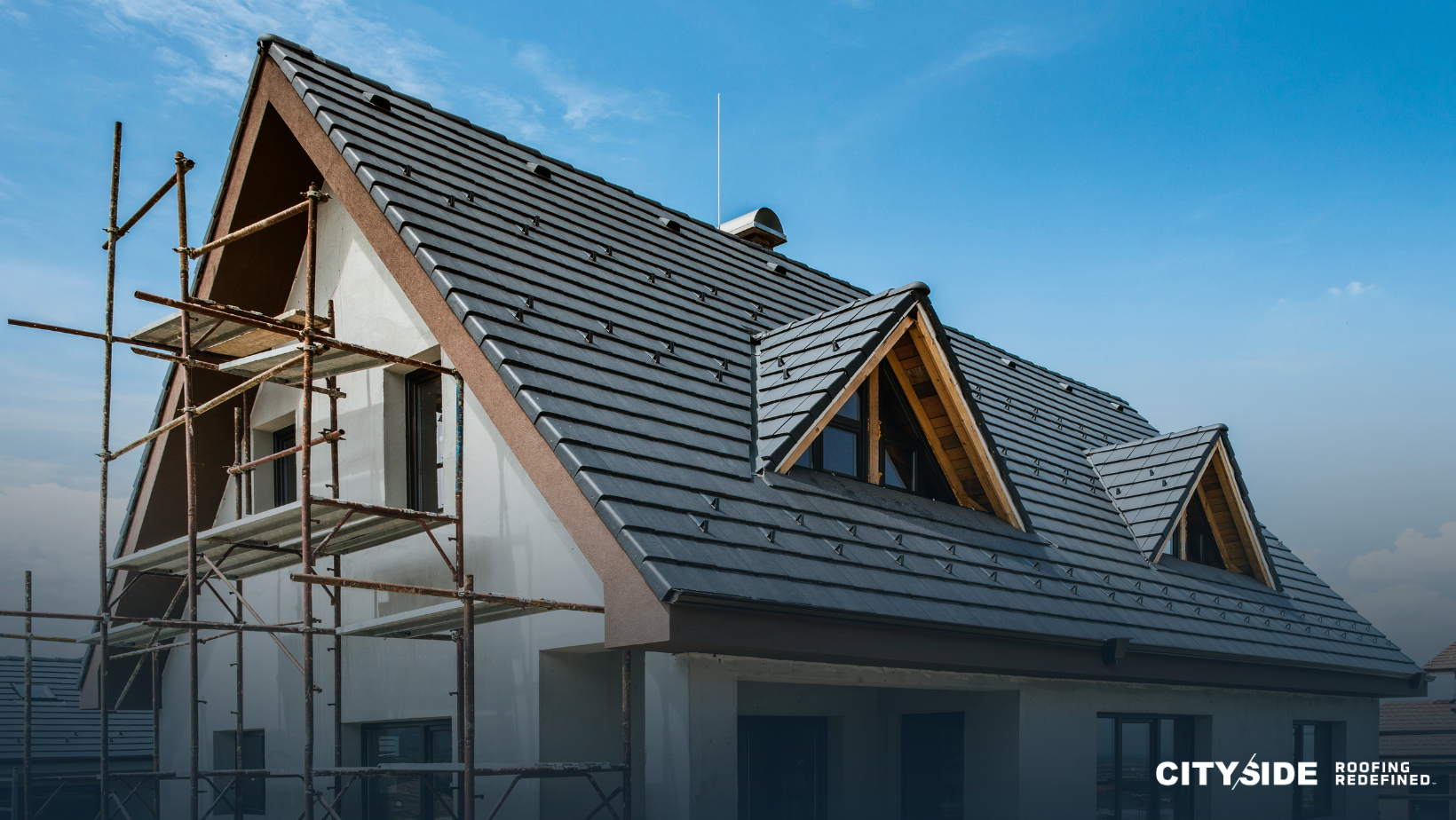 A house under construction, featuring a roof that is currently being built, showcasing the progress of the project.