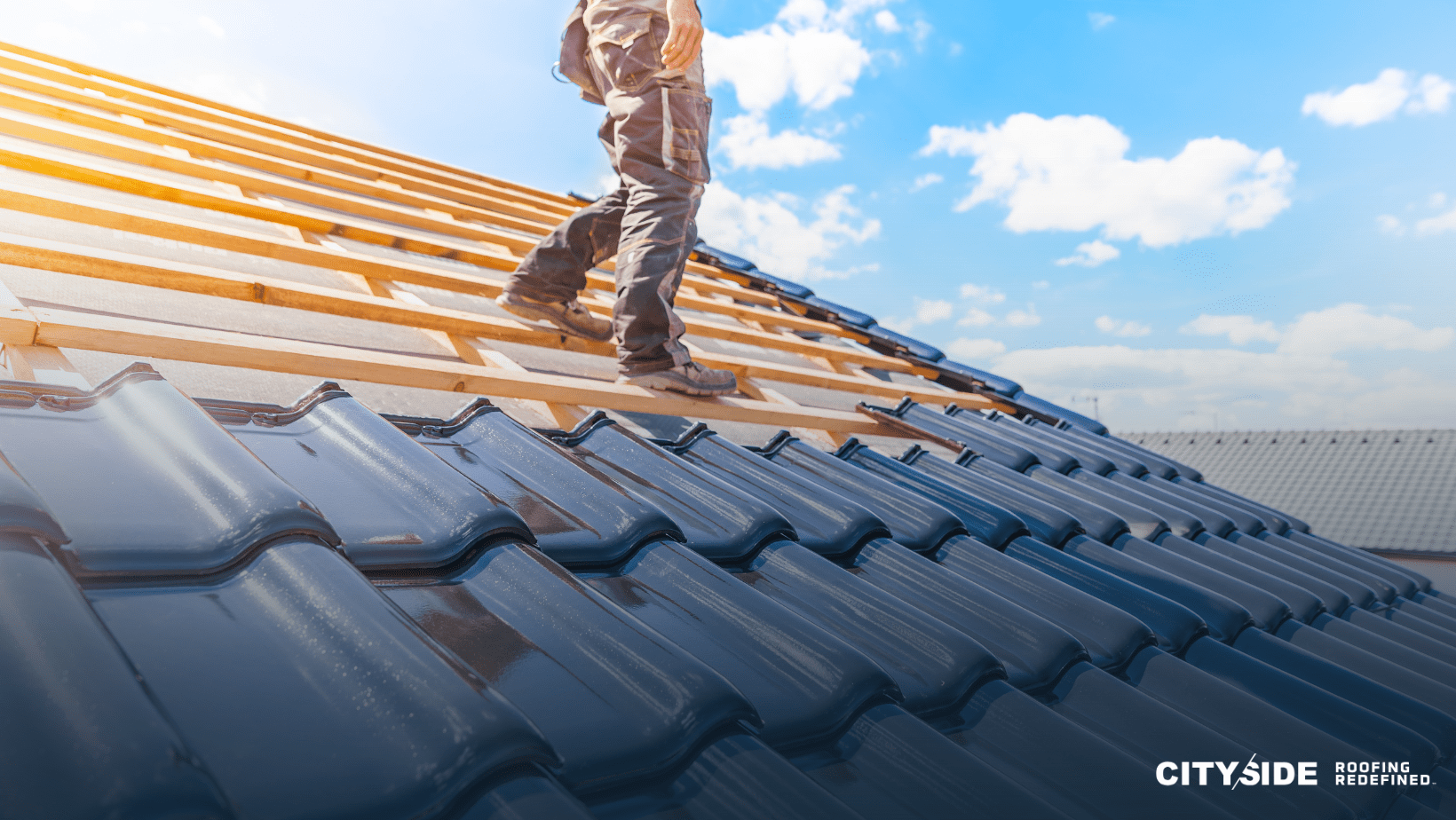 A man stands confidently on the roof of a house, overlooking the surroundings with a thoughtful expression.