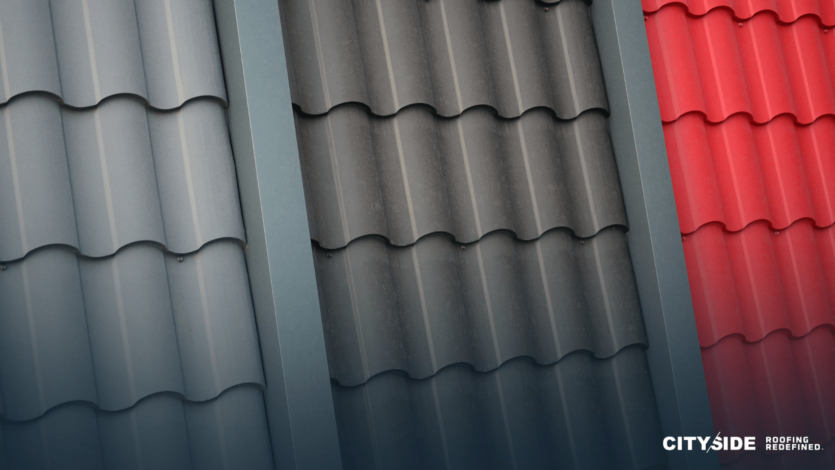 A red and black metal roof contrasts with a gray roof, showcasing a striking combination of colors and materials.
