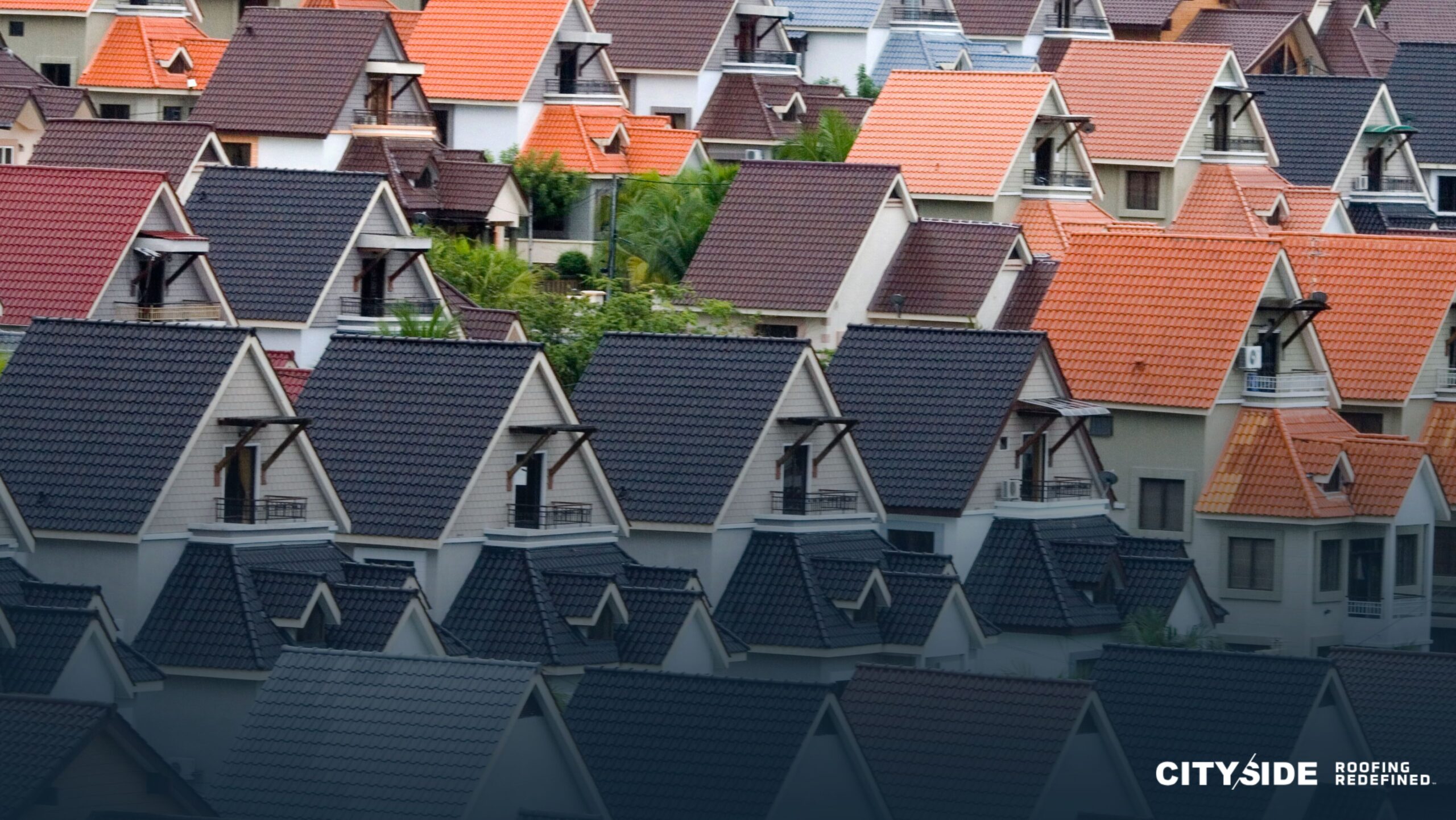 A row of houses featuring roofs in various vibrant colors, showcasing a charming and diverse neighborhood.