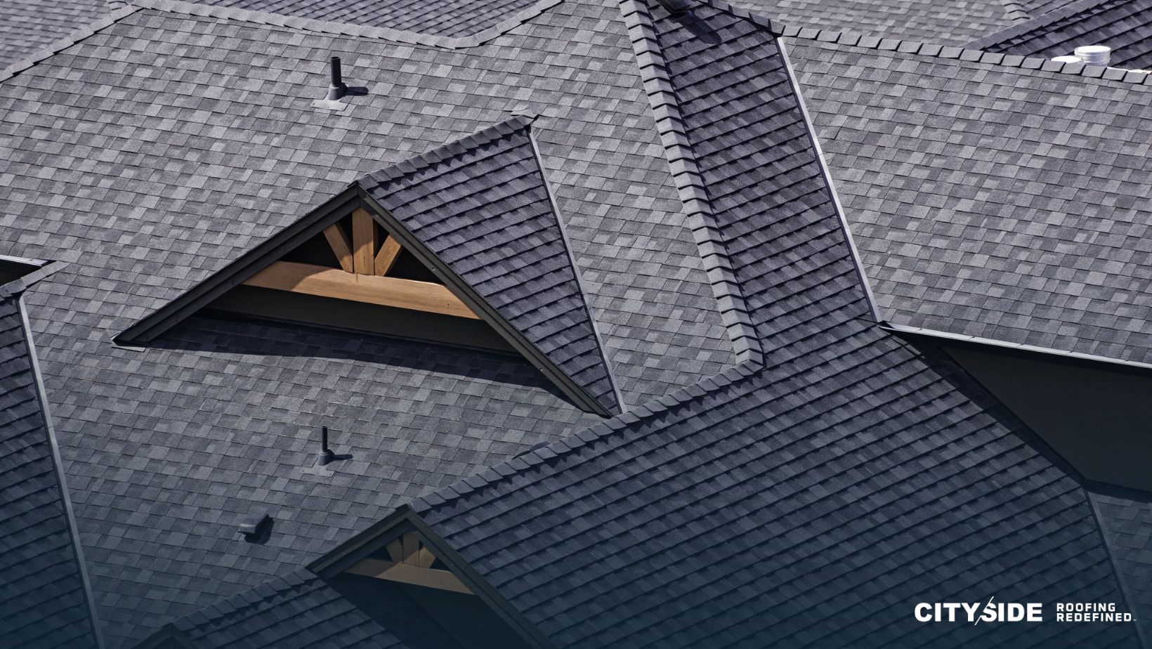 A triangular-shaped roof atop a house