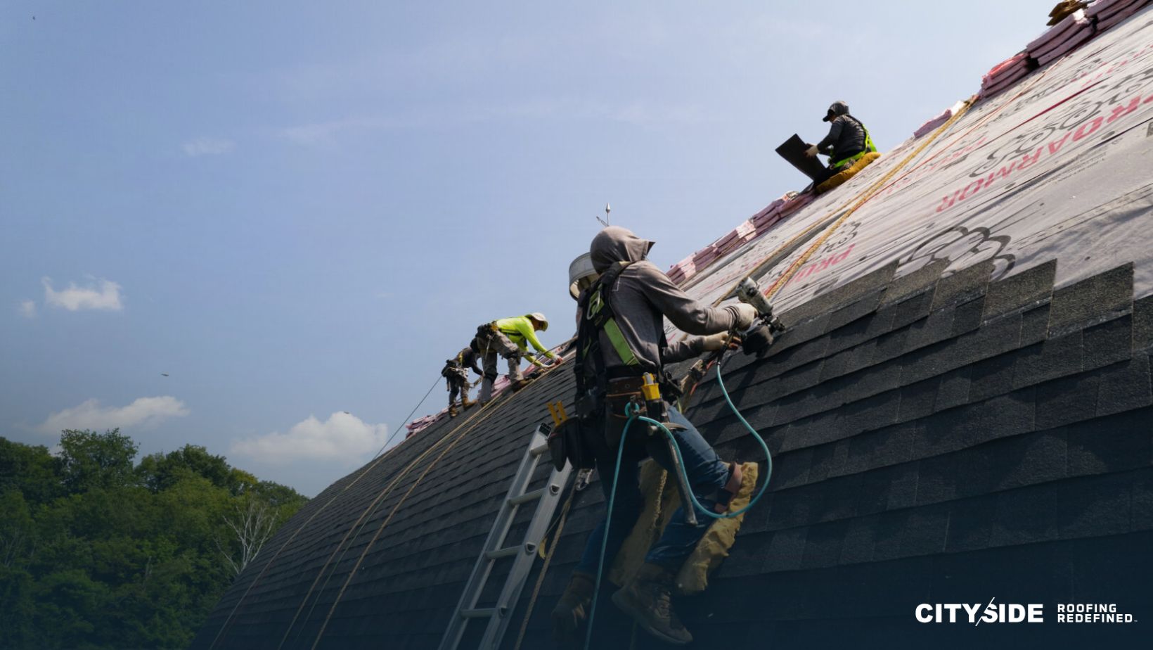 Construction workers on a roof