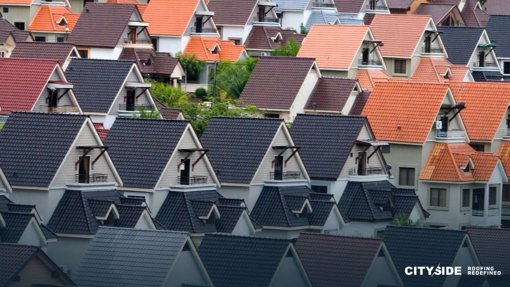 A row of houses featuring roofs in various colors