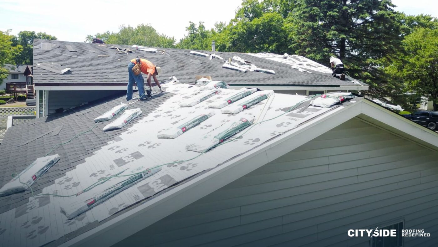 A man is working on a roof