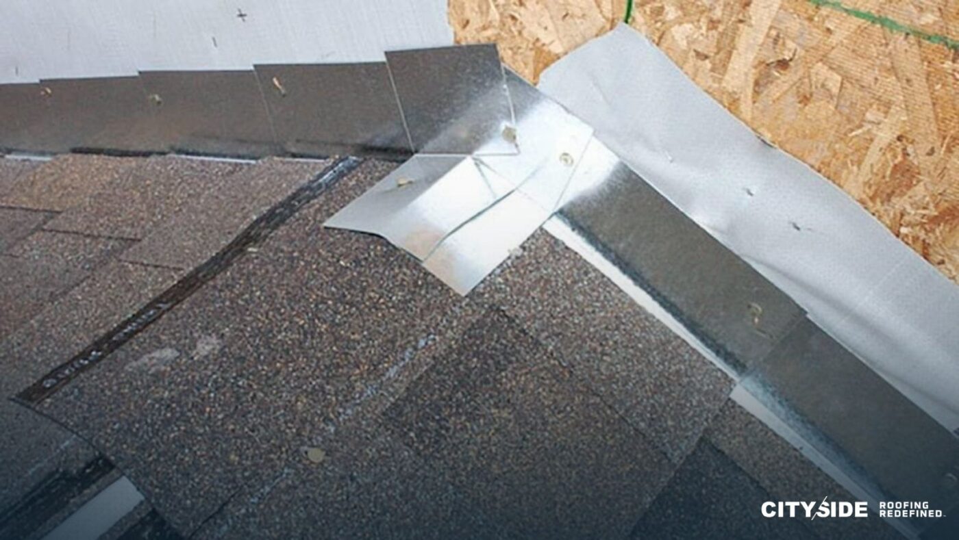 A close-up of a roofing shingle being installed on a house