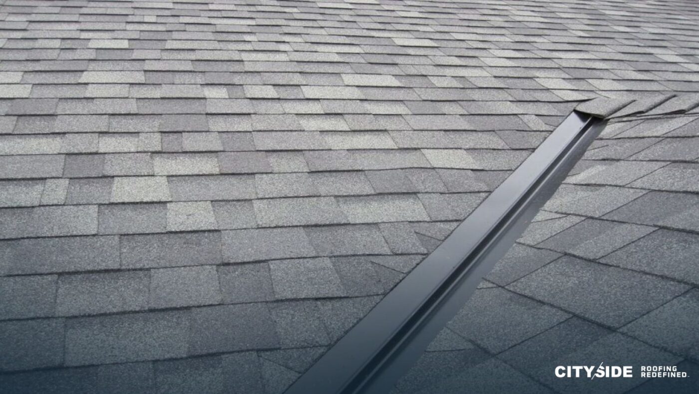 A house roof featuring black shingles