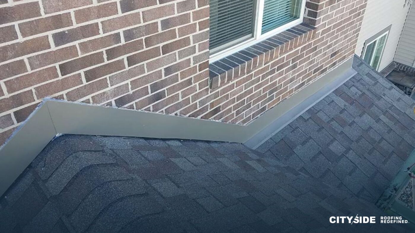 A roof featuring metal flashing along the side