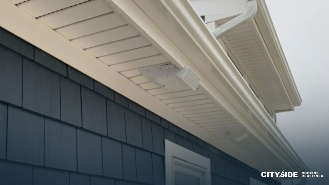 A house featuring a white roof and white siding