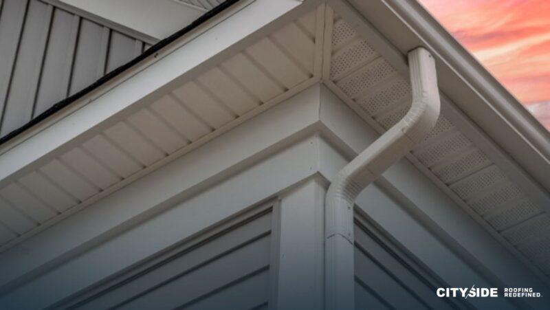 Close-up of a house's side with a clear blue sky in the background
