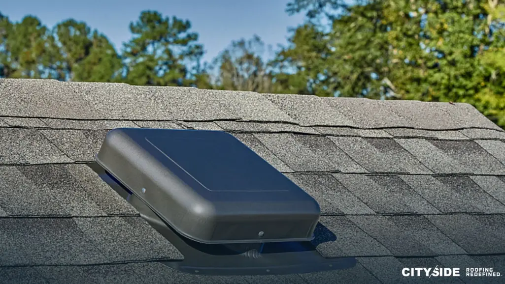 Roof vent topped with a small black box