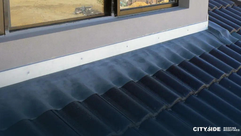 metal roof featuring window