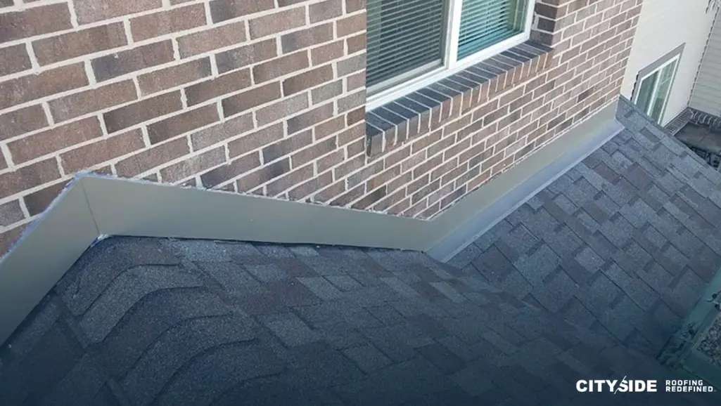 A roof featuring metal flashing alongside