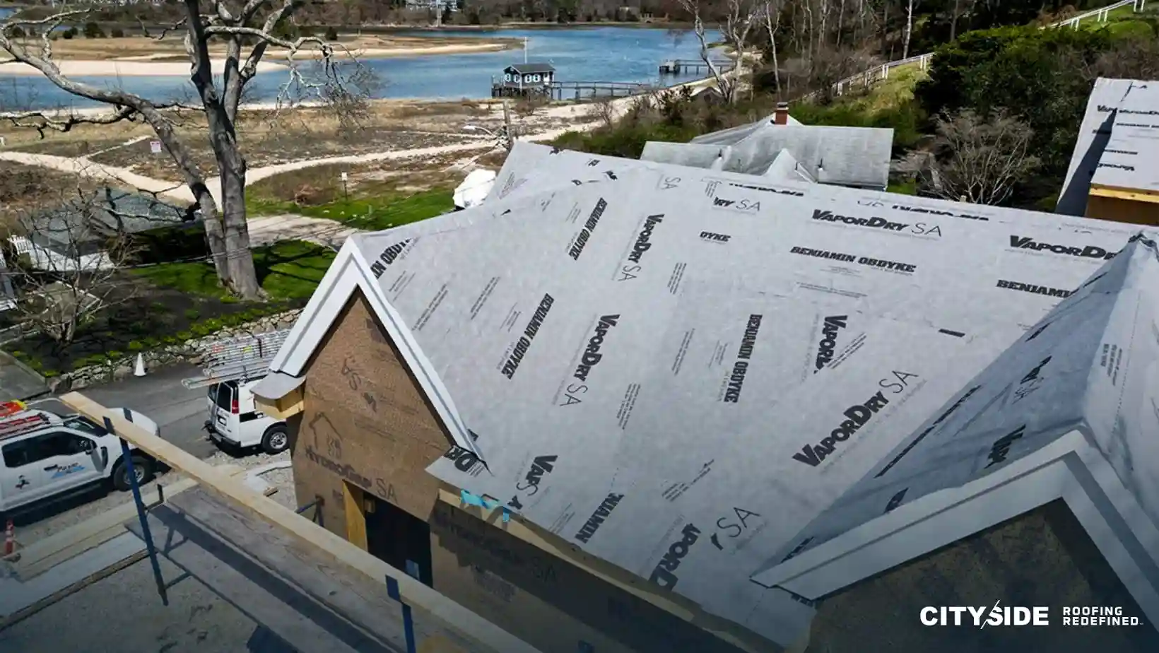 An image of a house featuring a boat placed on its roof