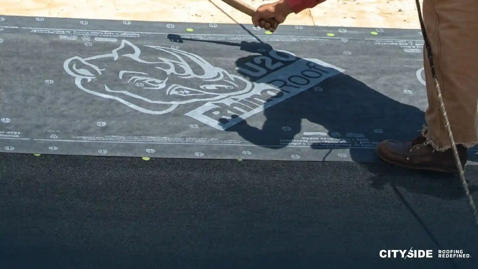roof underlayment visible in the background.