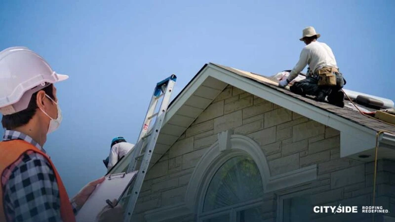 A man is repairing the roof of a house